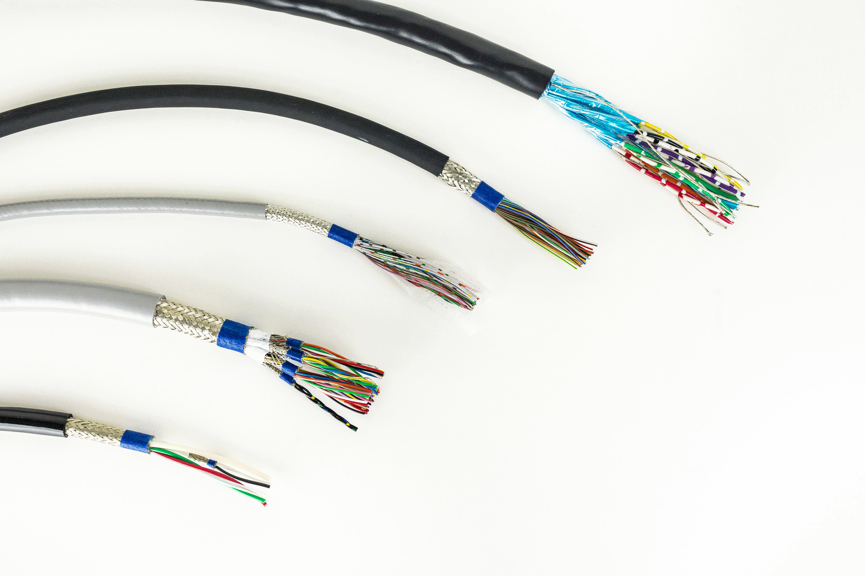 Closeup of 5 cables with interior exposed on white background showing some of Northwire's custom cable solutions